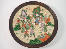 A Japanese large crackle glaze charger decorated figures, 36cm diameter