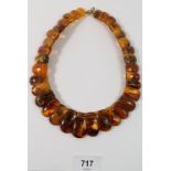 A Baltic amber collar link necklace, 64g, clasp a/f