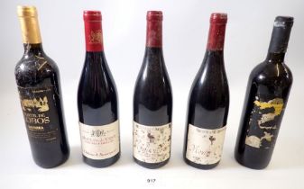 Five various bottles of red wine including Moulin a Vent and Portil de Lobos