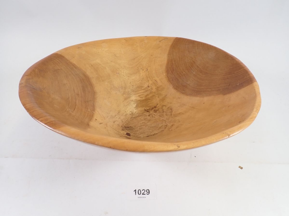 A carved wooden rustic bowl, 29cm