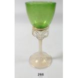 A 19th century Salviati green glass goblet on openwork and tapered opaque hollow stem, 17cm tall