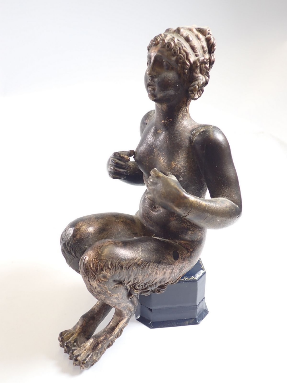 An antique bronze figure of a female faun seated (lacking base) 22cm tall - Image 2 of 4