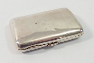 A silver cigarette case, Birmingham 1899, 61g