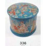 A Victorian papier-mache lidded pot with Japanese domestic family scene, 6.5cm tall