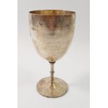 A Victorian silver goblet with engraved border, the inscription worn, 18.5cm tall by Charles