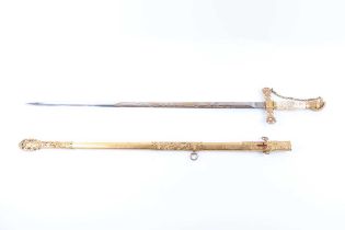 A 19th century American Knights Templar sword, fully gilded with an ivory pommel, manufactured