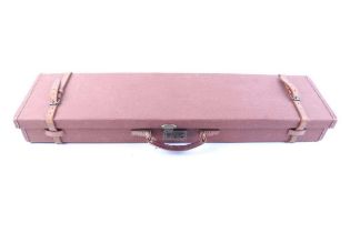 A good Brady canvas and leather gun case, with green baize lined fitted interior for up to 30 ins
