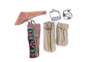 A Swedish leather holster, two Sten gun magazine webbing pouches, two stirrups, two sets of spurs,