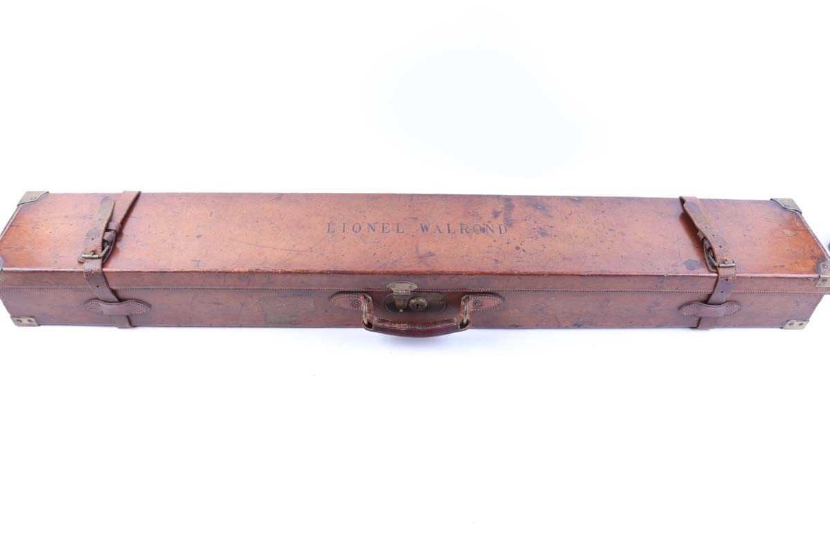 An oak and leather rifle case with brass corners, monogrammed Lionel Walrond, red baize lined fitted - Image 2 of 3