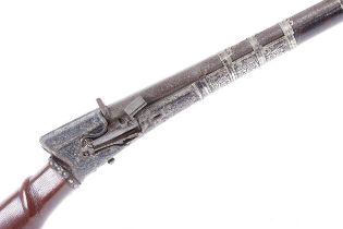 (S58) A Turkish Miquelet Musket, 37½ ins etched-damascus rifled barrel with decorated swamped