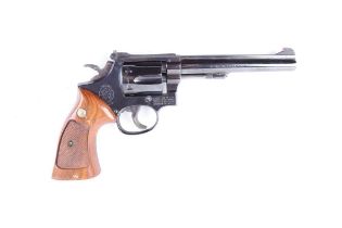 A deactivated .22 Smith & Wesson Model 17 double-action revolver, 6 ins sighted barrel, fluted 6