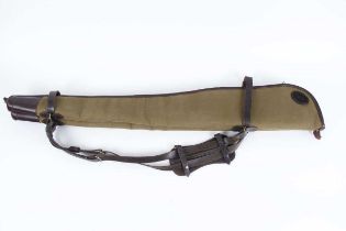 A fleece-lined canvas and leather double gun slip by Ward, London