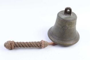 A military issue brass bell, stamped broad arrow, no. 7500