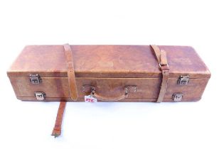 Gunmark tan double gun case, each compartment green baize lined and fitted for 30 ins barrels,