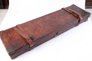 Leather gun case, baize lined interior fitted for 30 ins barrels, George Hinton trade label, with