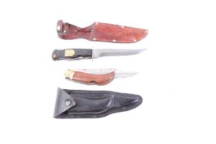 Stalking knife by Solingen, in sheath; 5½ ins folding knife in leather sheath (2)
