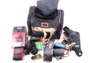 Holdall with Hawke LRF400 and WO Sports monoculars, two Swiss Arms leg holsters, two wind meters,