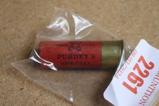 Ⓕ (S2) A 12 bore Purdey's Special 2½ ins shot cartridge with King George VI crown on top card