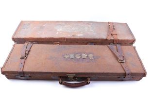 Two canvas and leather gun cases for restoration