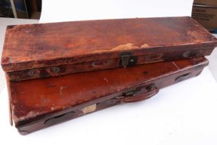 Two leather gun cases for restoration - each with fitted interior for 29 ins barrels