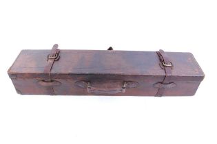 Brown leather gun case, baize-lined fitted interior for 30 ins barrels, Joseph Lang trade label
