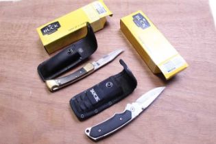 Boxed Buck Alpha Hunter knife and Buck Omni Hunter folding knife