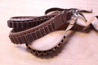 Three leather gun belts: .410, 20 bore, and 16 bore