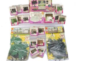 A collection of original carded and boxed Britains Herald plastic Floral Miniature Garden flora and