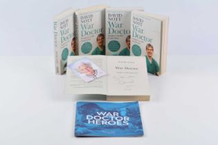 Five paperback editions of David Nott's War Doctor,