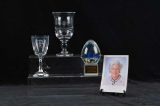 A commemorative glass goblet,