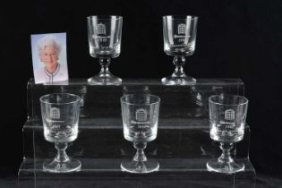 A set of five wine goblets,