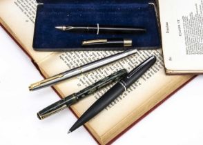 Four vintage and modern pens,