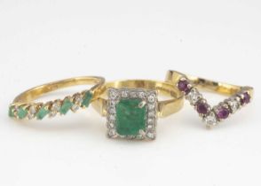 A collection of three gem set dress rings,