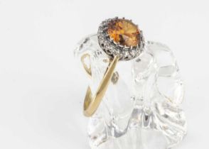 An 18ct gold zircon and diamond dress ring,