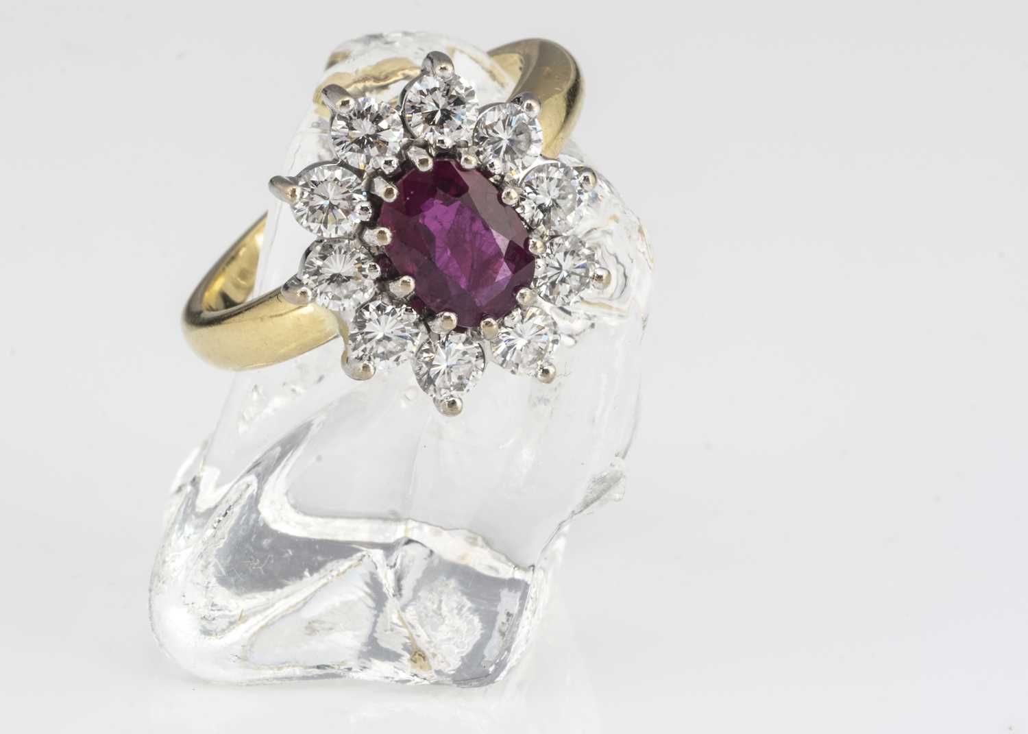 An 18ct gold ruby and diamond cluster ring,