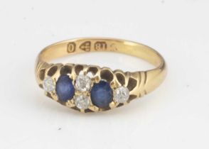 A late Victorian 18ct gold sapphire and diamond ring,