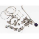 Eight items of silver and white metal jewellery,