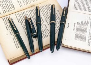 Five vintage Parker fountain pens,