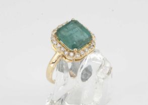 PLEASE NOTE THIS RING IS 14CT GOLD! An 18ct gold emerald and diamond dress ring,
