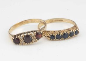 Two 9ct gold gem set dress rings,
