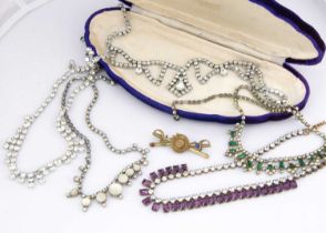 A collection of paste jewels,