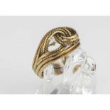 An 18ct gold rope twist knot ring,
