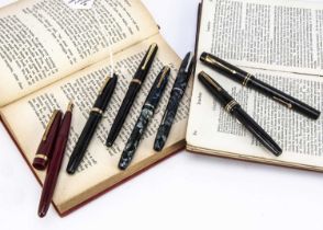 A collection of seven Conway Stewart fountain pens,