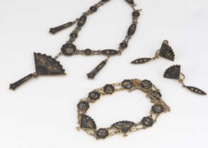 A Japanese Shakudo necklace, Meiji in period,