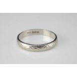 A platinum wedding band,