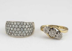 An 18ct gold crossover three stone illusion set diamond dress ring,