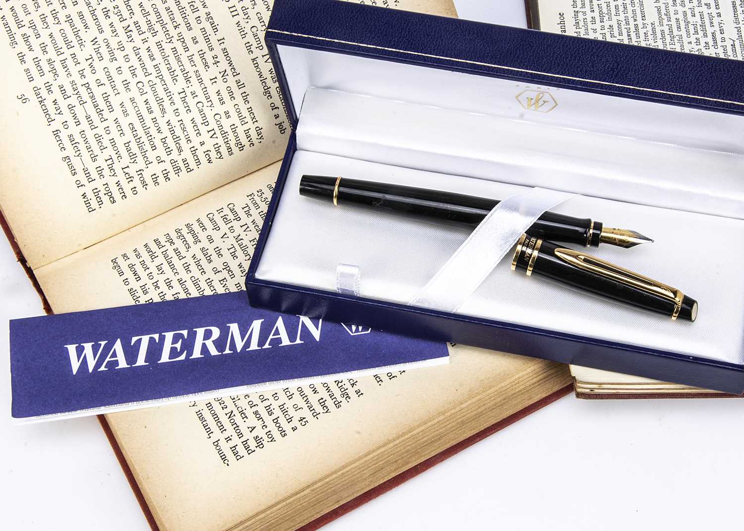 A modern boxed Waterman black and gilt fountain pen,