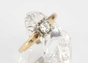 An 18ct gold Columbia marked diamond solitaire,