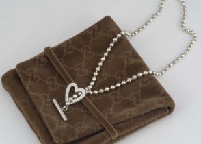 A Gucci silver heart necklace,