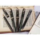 Five vintage Parker fountain pens,